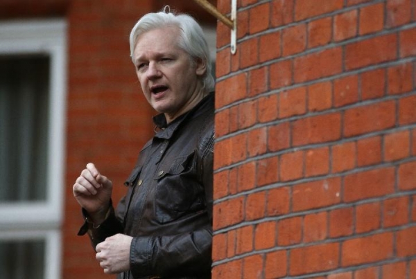Julian Assange at Equadorian embassy. /AP=yonhap